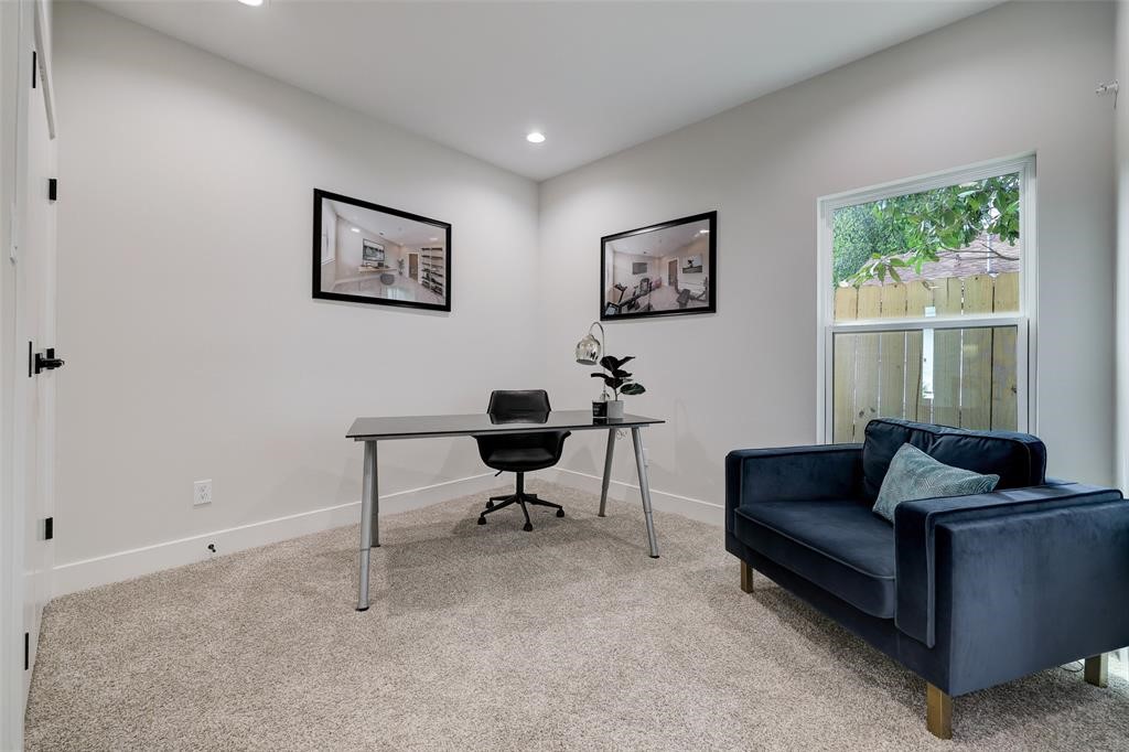 846 Elkhart Street, Unit E Houston, TX 77091 - Photo 17 of 24 a living room with furniture and a window