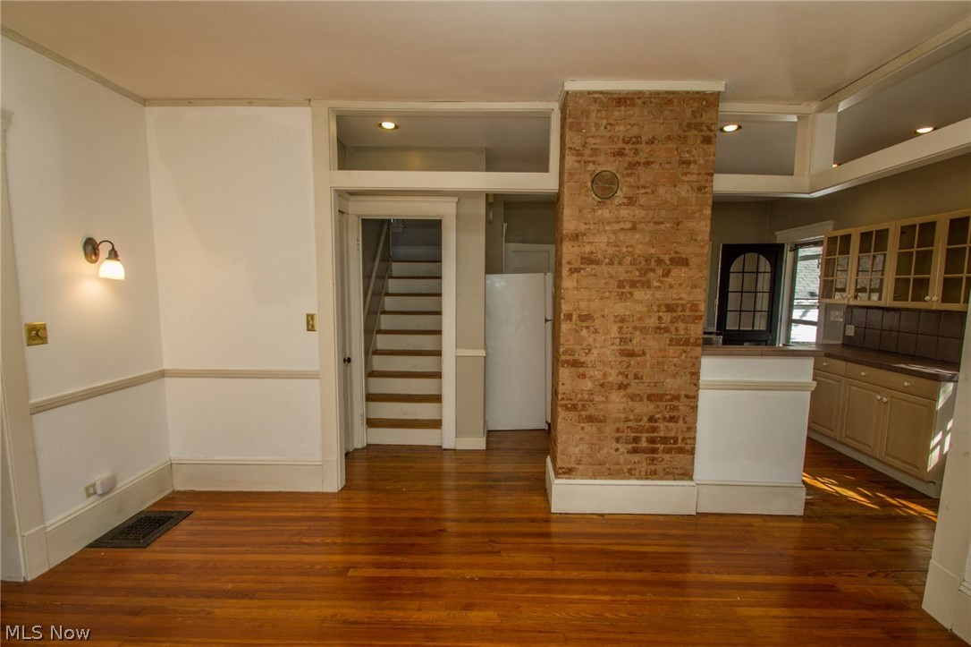 1629 Crest Road Cleveland Heights, OH 44121 - Photo 6 of 29 Kitchen redesign opened the first floor space for great entertaining. Second stairway view. Soho-like exposed brick, Country-french kitchen.