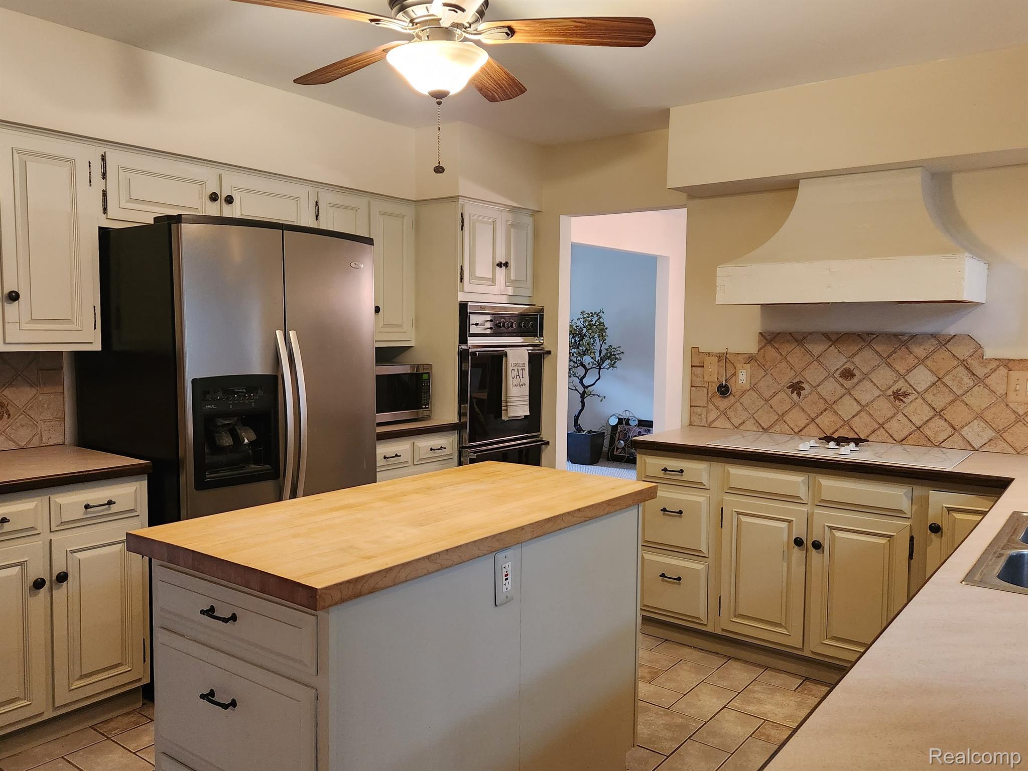 6225 Richardson Road Howell, MI 48843 - Photo 9 of 27 Butcher block island counter.