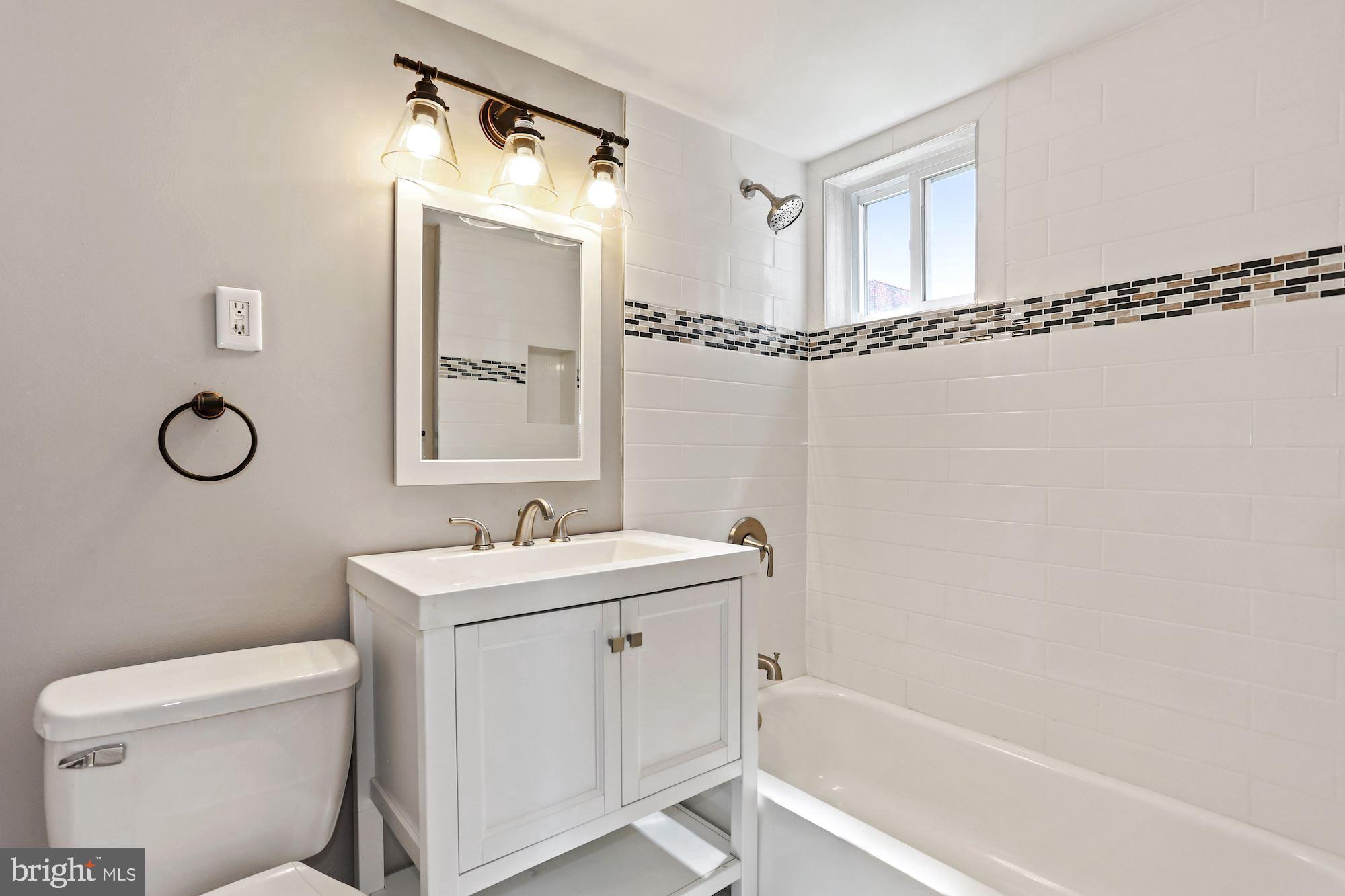 12 Halley Place Southeast, Unit 101 Washington, DC 20032 - Photo 14 of 19 Bathroom