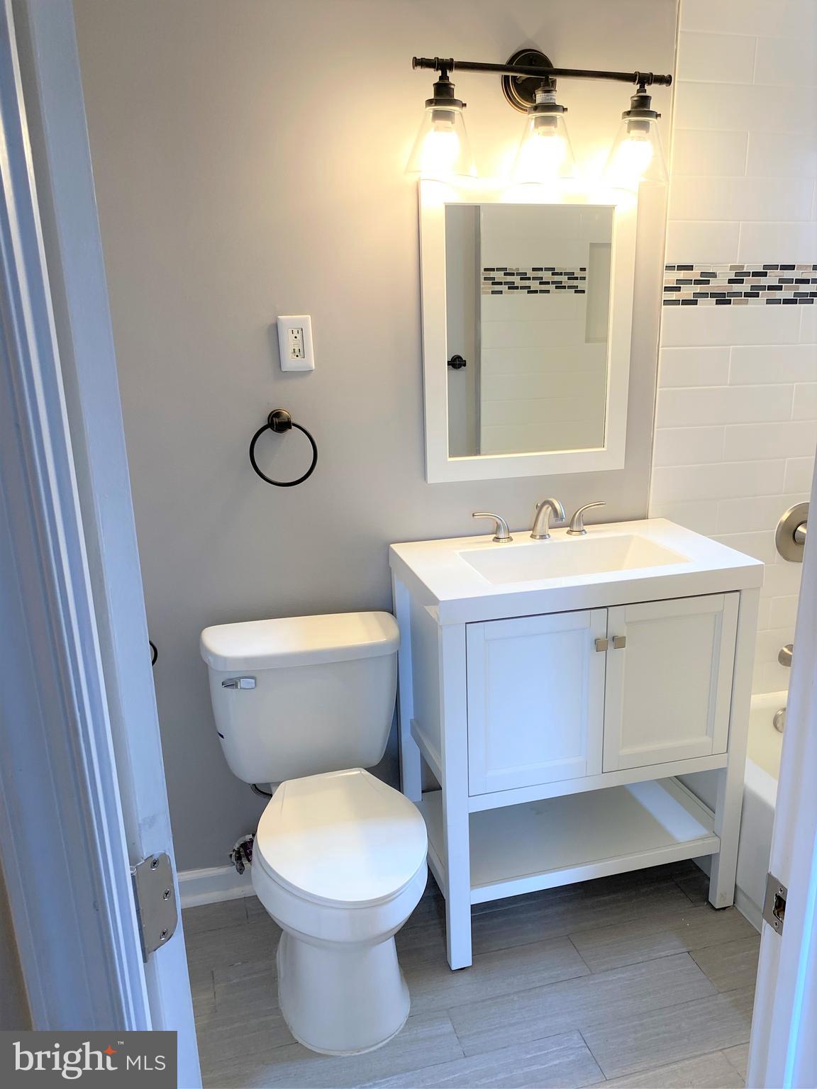 12 Halley Place Southeast, Unit 101 Washington, DC 20032 - Photo 15 of 19 Bathroom