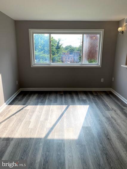 12 Halley Place Southeast, Unit 101 Washington, DC 20032 - Photo 4 of 19 Living room with large windows