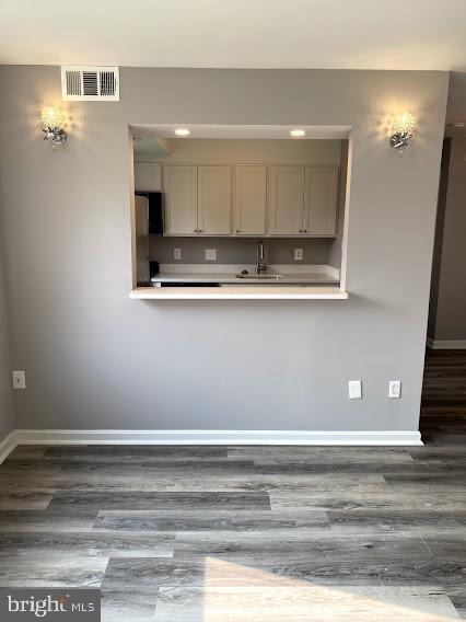 12 Halley Place Southeast, Unit 101 Washington, DC 20032 - Photo 5 of 19 Pass though into kitchen