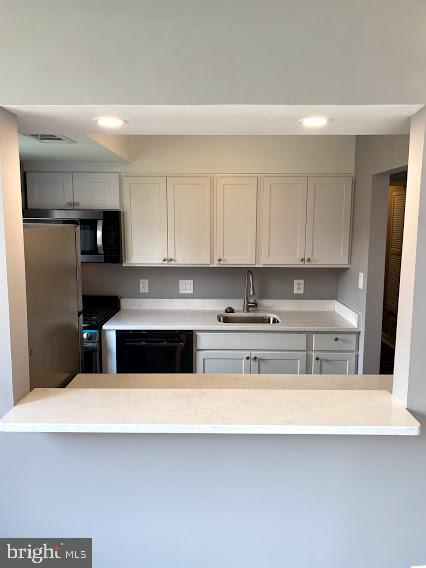 12 Halley Place Southeast, Unit 101 Washington, DC 20032 - Photo 6 of 19 White quarts counters