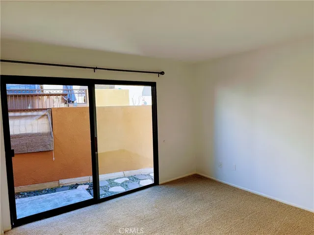 an empty room with a large window