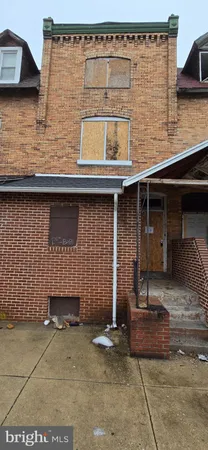 a front view of a house with a garage