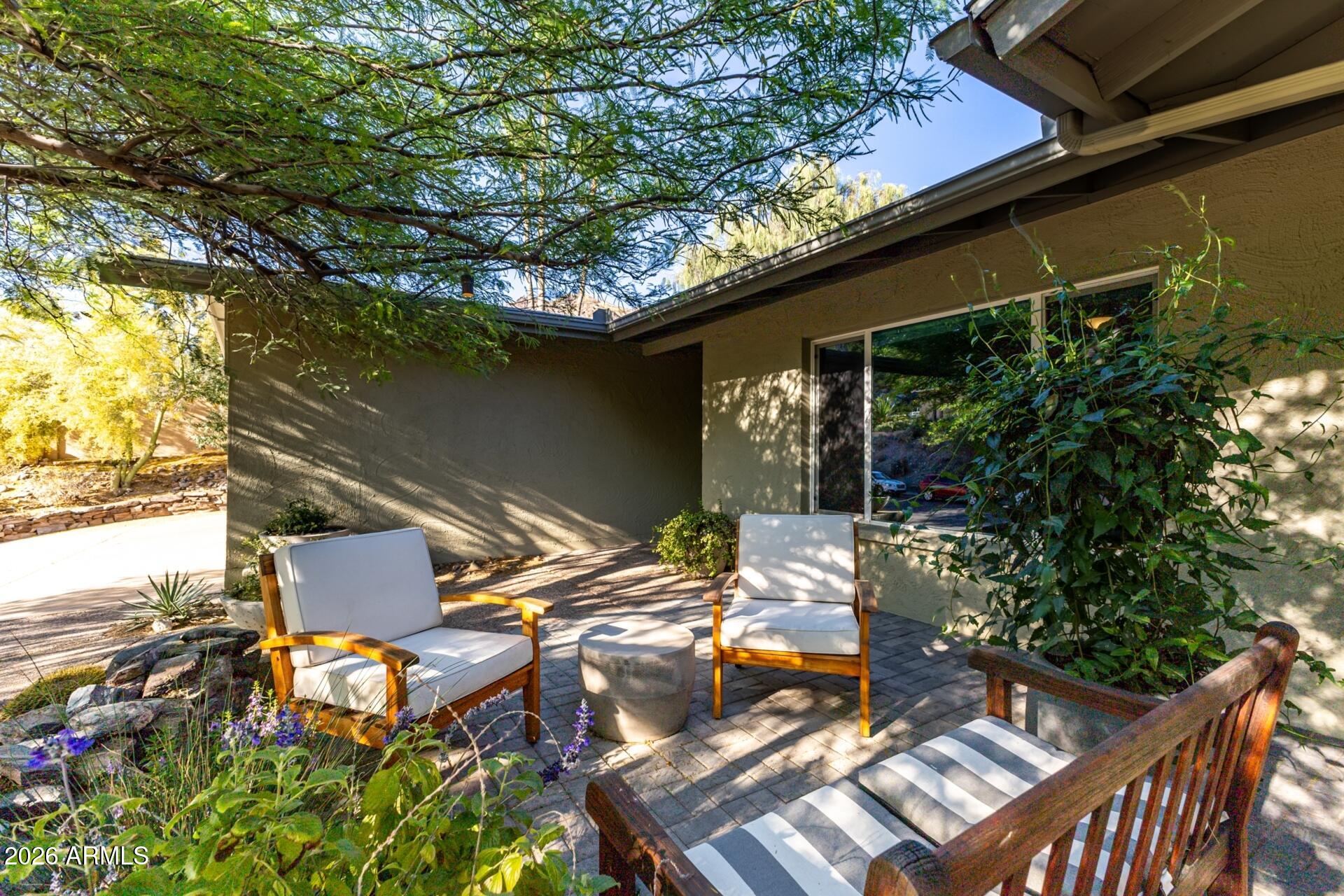 7657 North 22nd Street Phoenix, AZ 85020 - Photo 12 of 76 a view of backyard with outdoor seating and plants