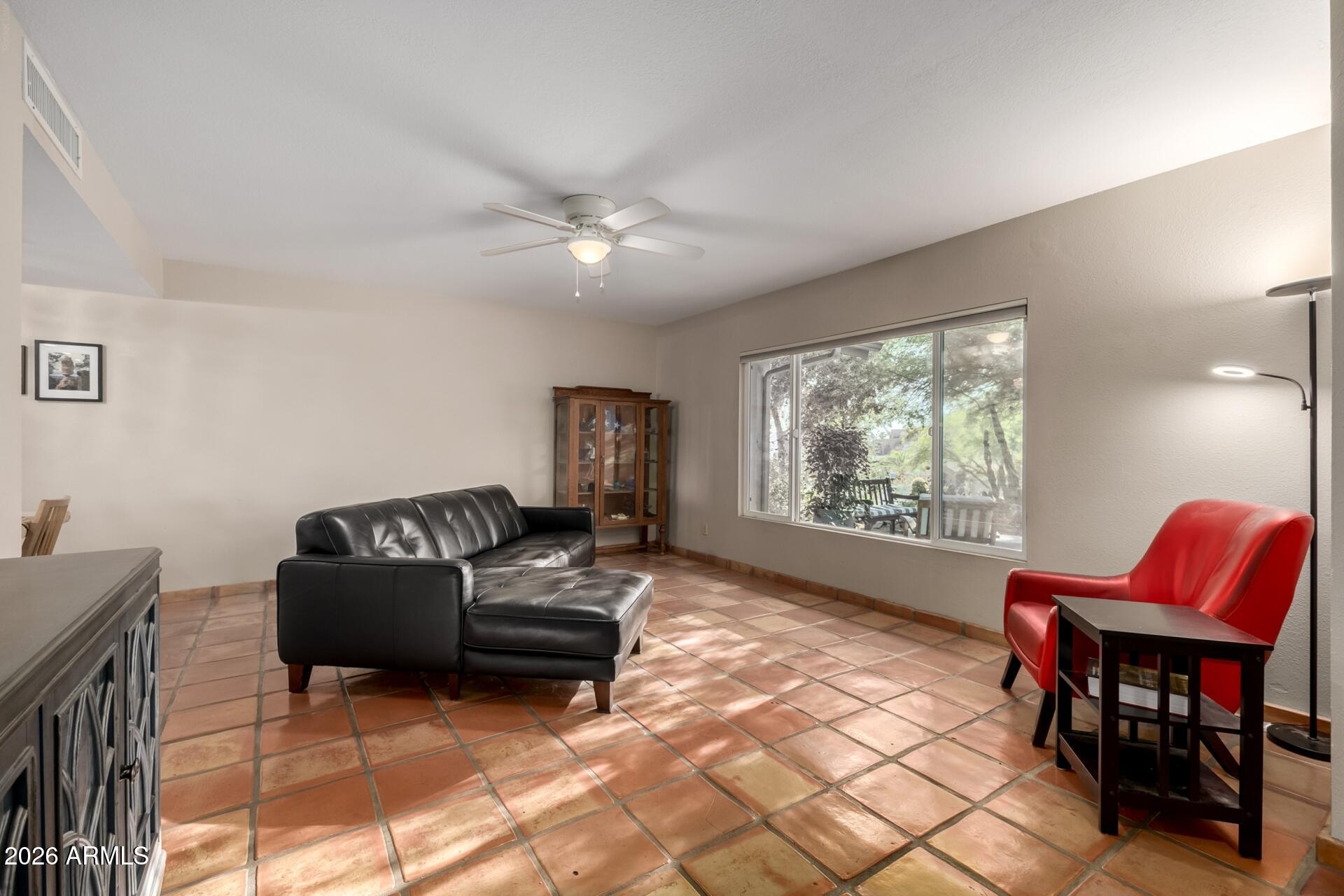 7657 North 22nd Street Phoenix, AZ 85020 - Photo 14 of 76 a living room with furniture and a large window