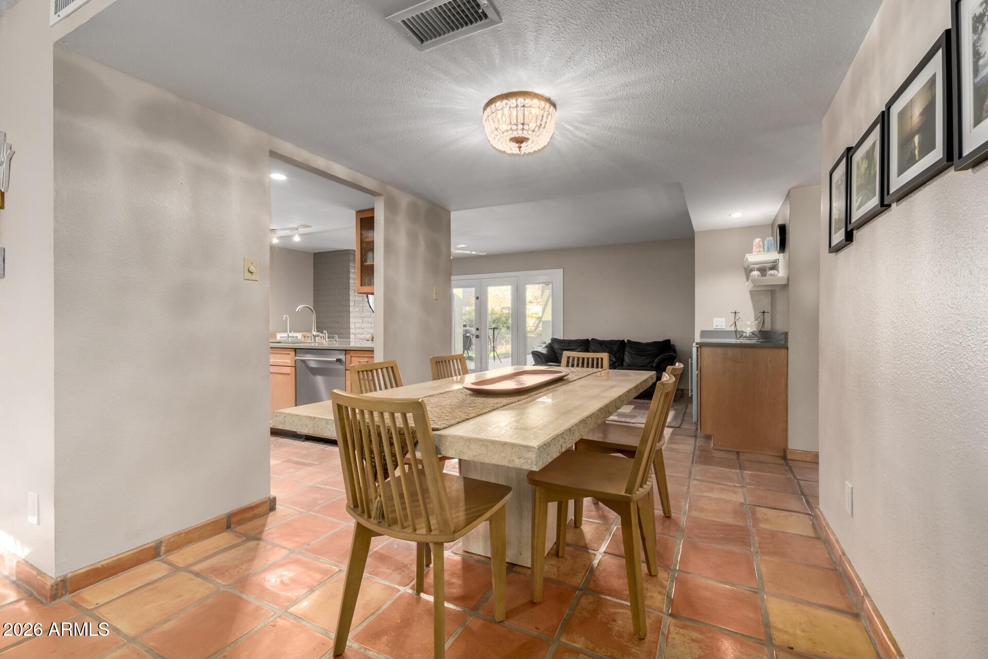 7657 North 22nd Street Phoenix, AZ 85020 - Photo 17 of 76 a view of a dining room with furniture
