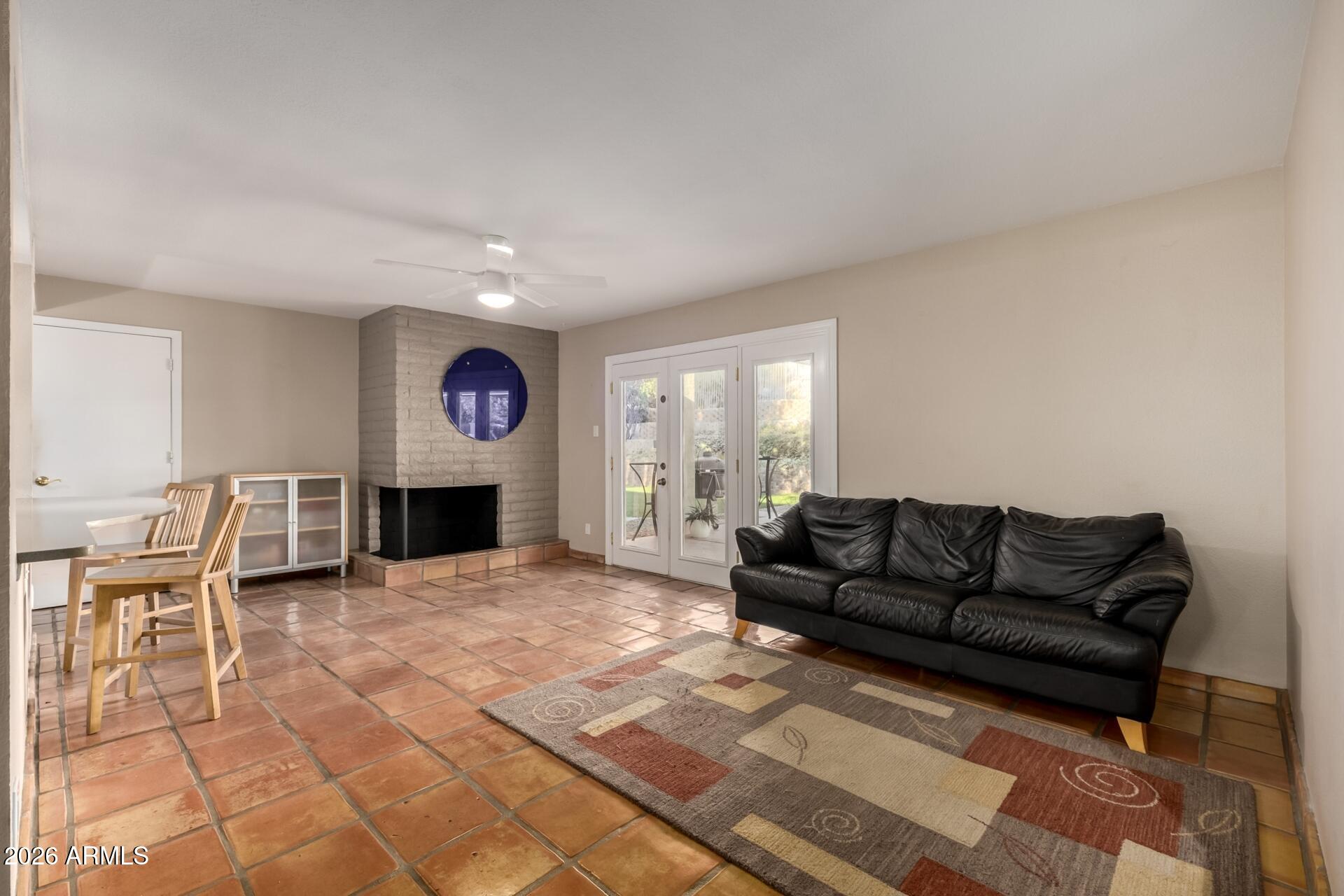 7657 North 22nd Street Phoenix, AZ 85020 - Photo 22 of 76 a living room with furniture and a fireplace