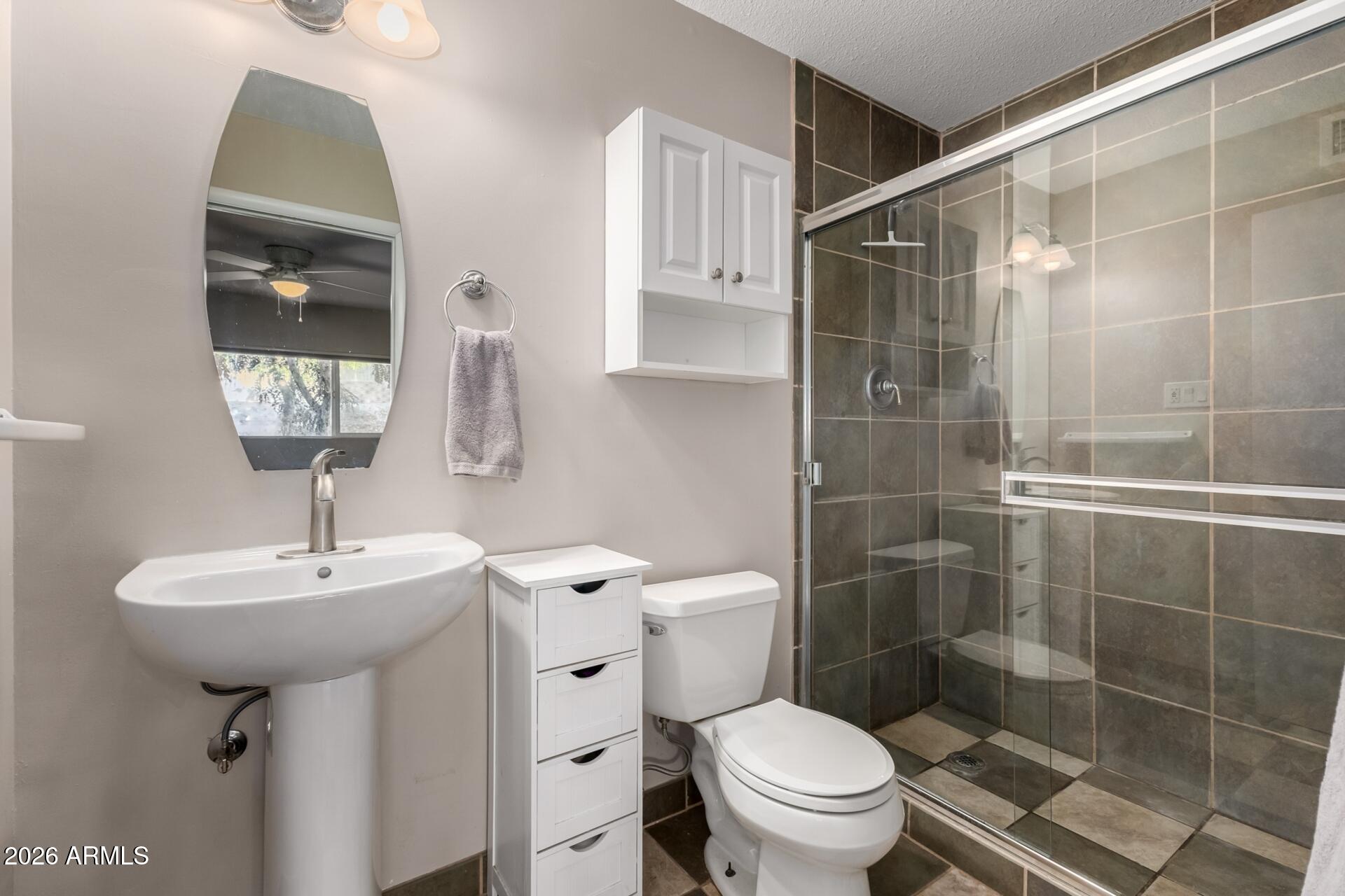 7657 North 22nd Street Phoenix, AZ 85020 - Photo 28 of 76 a bathroom with a sink toilet and shower
