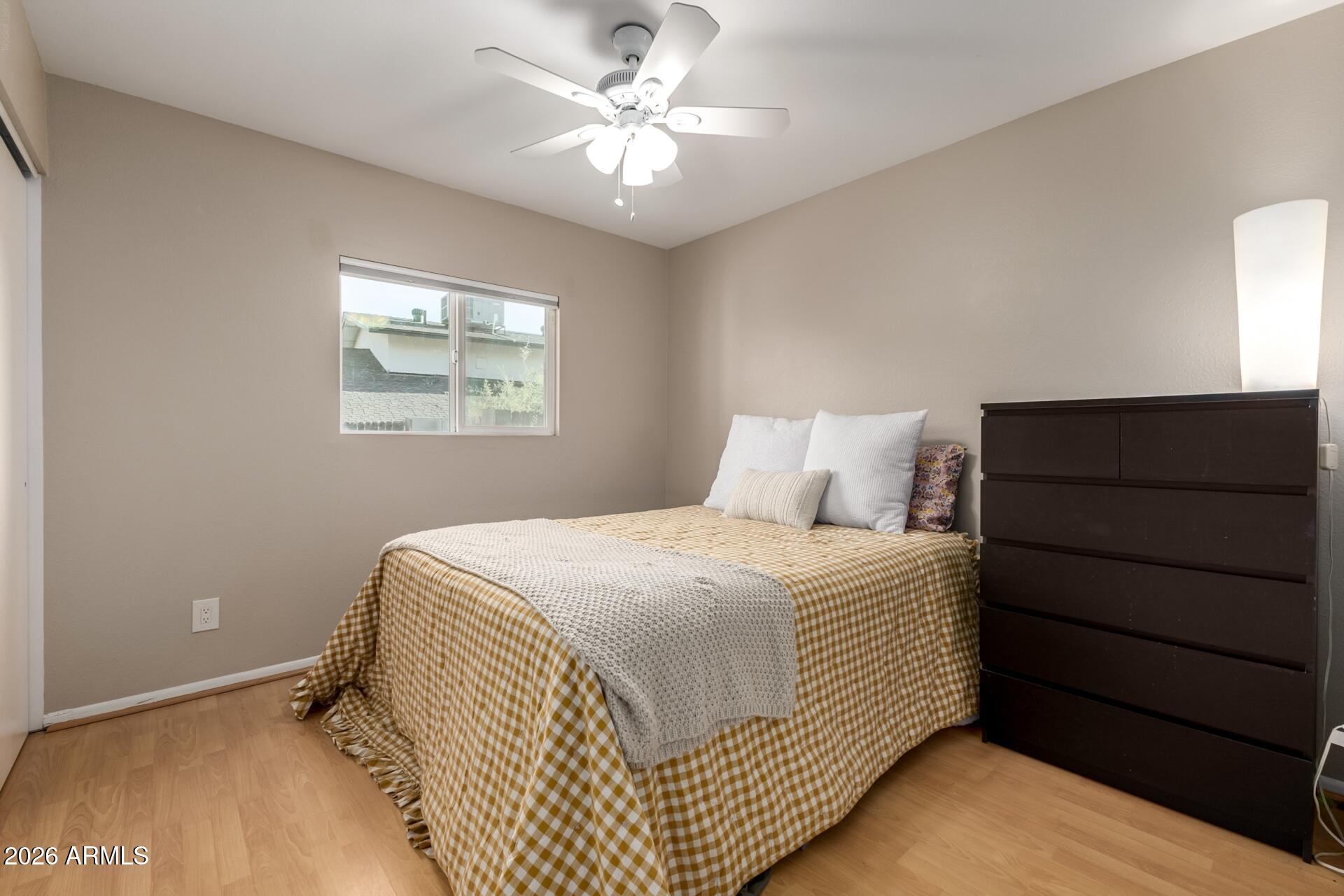 7657 North 22nd Street Phoenix, AZ 85020 - Photo 32 of 76 a bedroom with a bed and a window