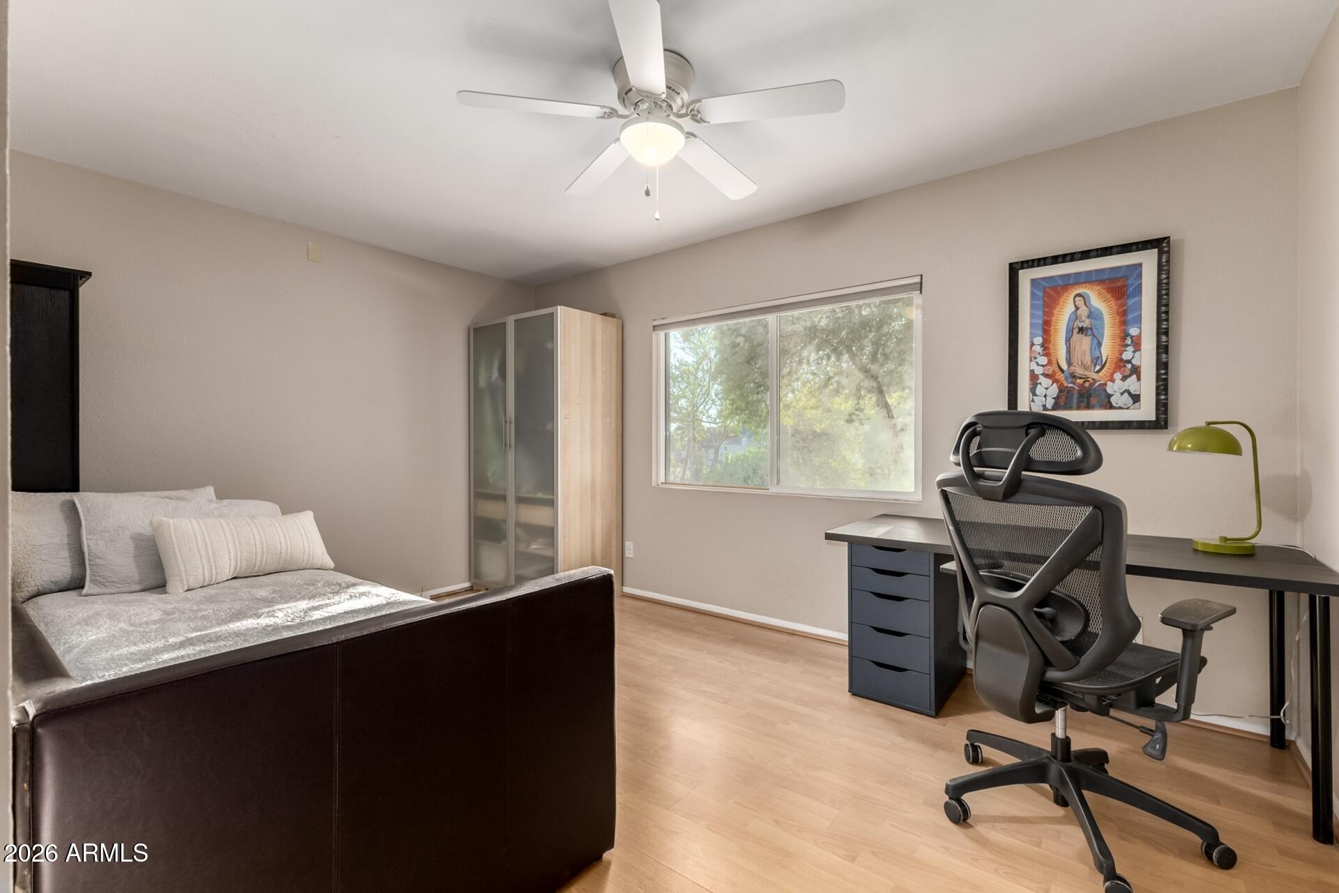 7657 North 22nd Street Phoenix, AZ 85020 - Photo 34 of 76 a bedroom with furniture and a window