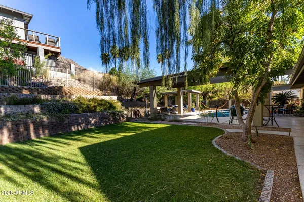 a view of a back yard of the house