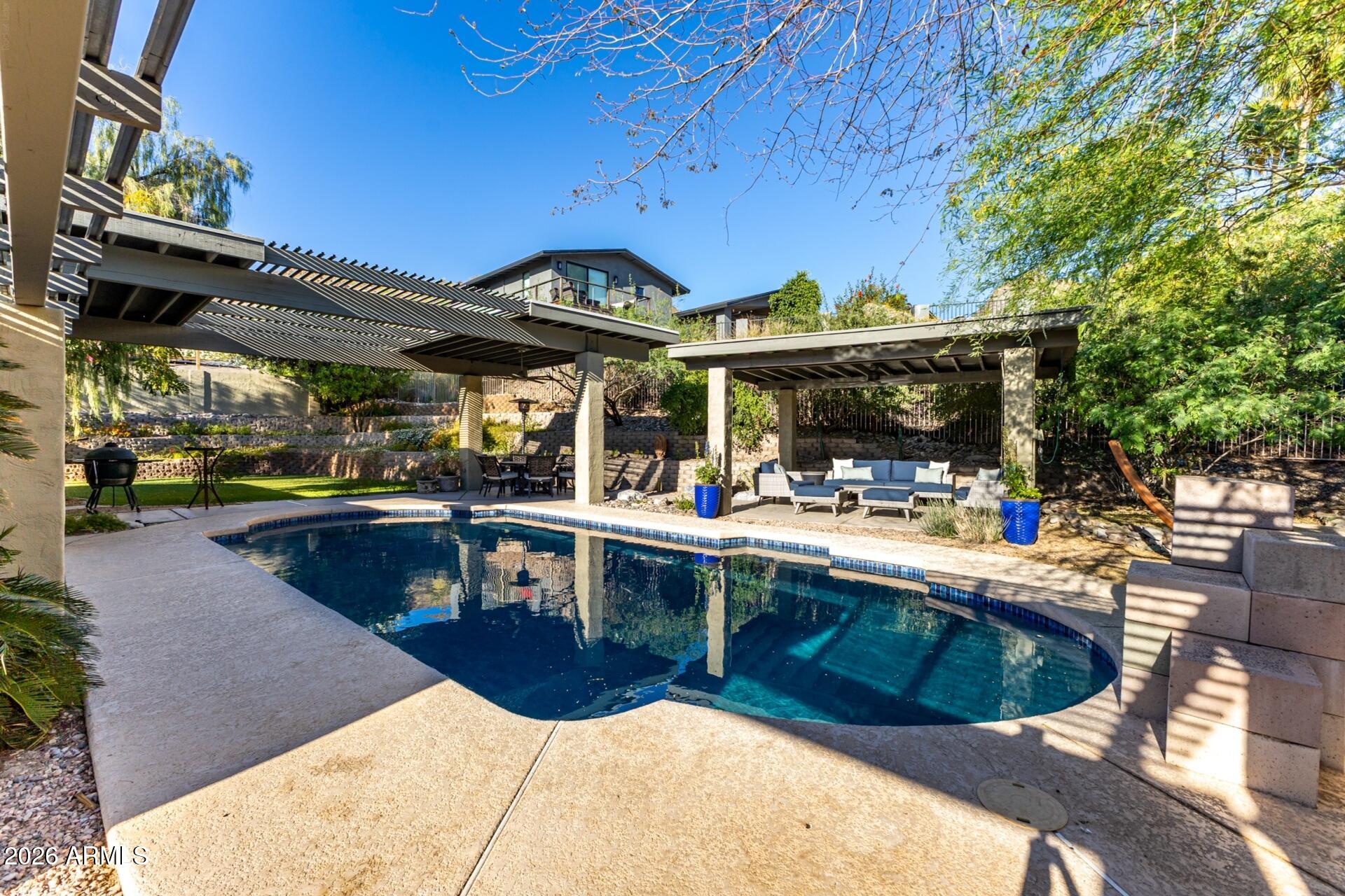 7657 North 22nd Street Phoenix, AZ 85020 - Photo 47 of 76 a view of a swimming pool with a patio