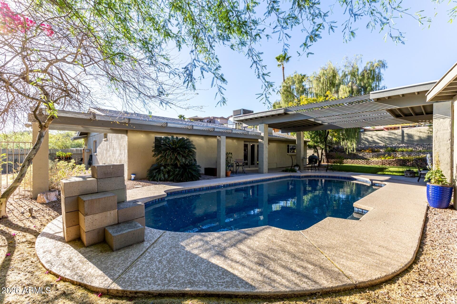 7657 North 22nd Street Phoenix, AZ 85020 - Photo 48 of 76 swimming pool view with a seating space