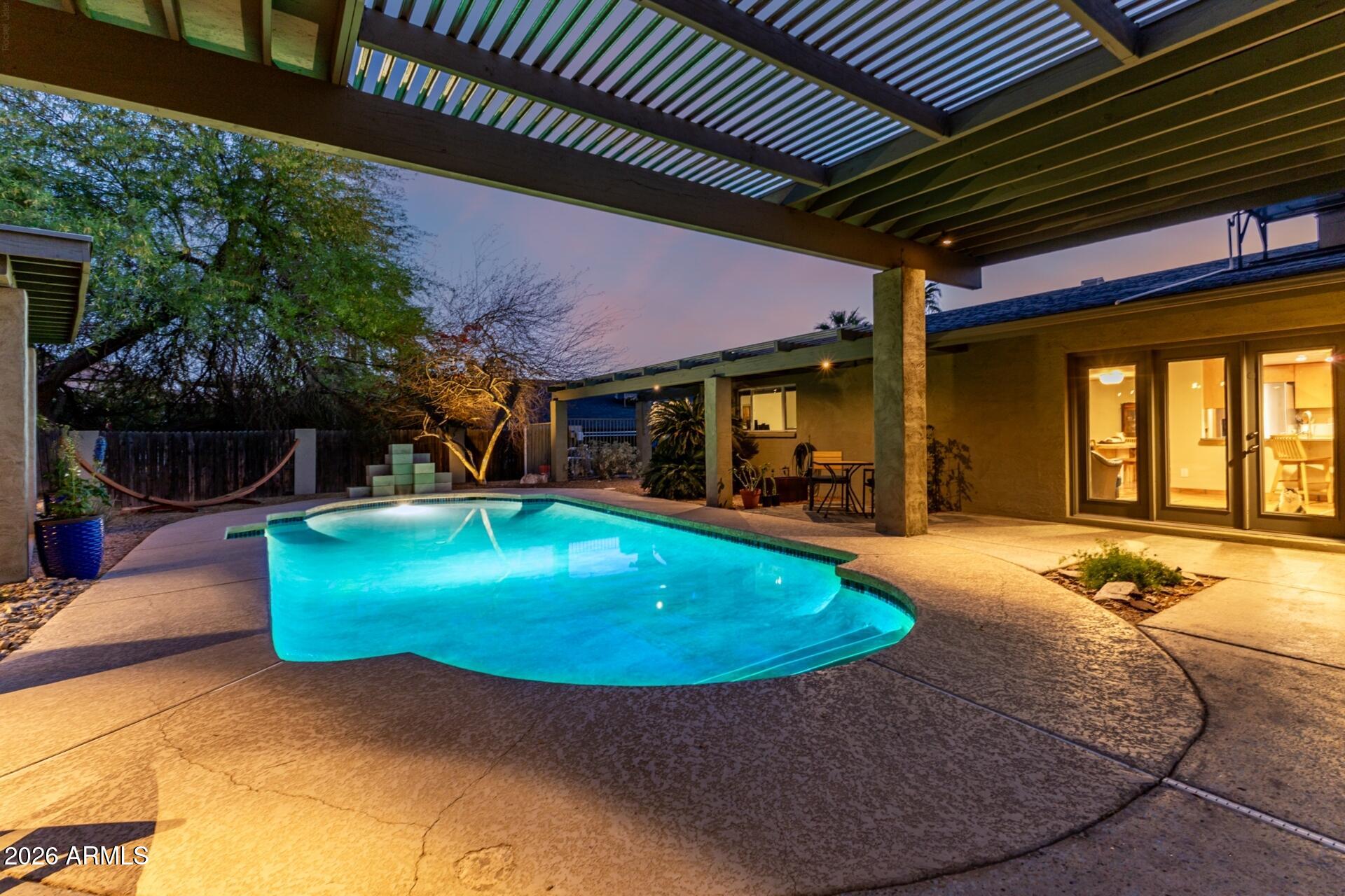7657 North 22nd Street Phoenix, AZ 85020 - Photo 6 of 76 an outdoor space with pool and furniture