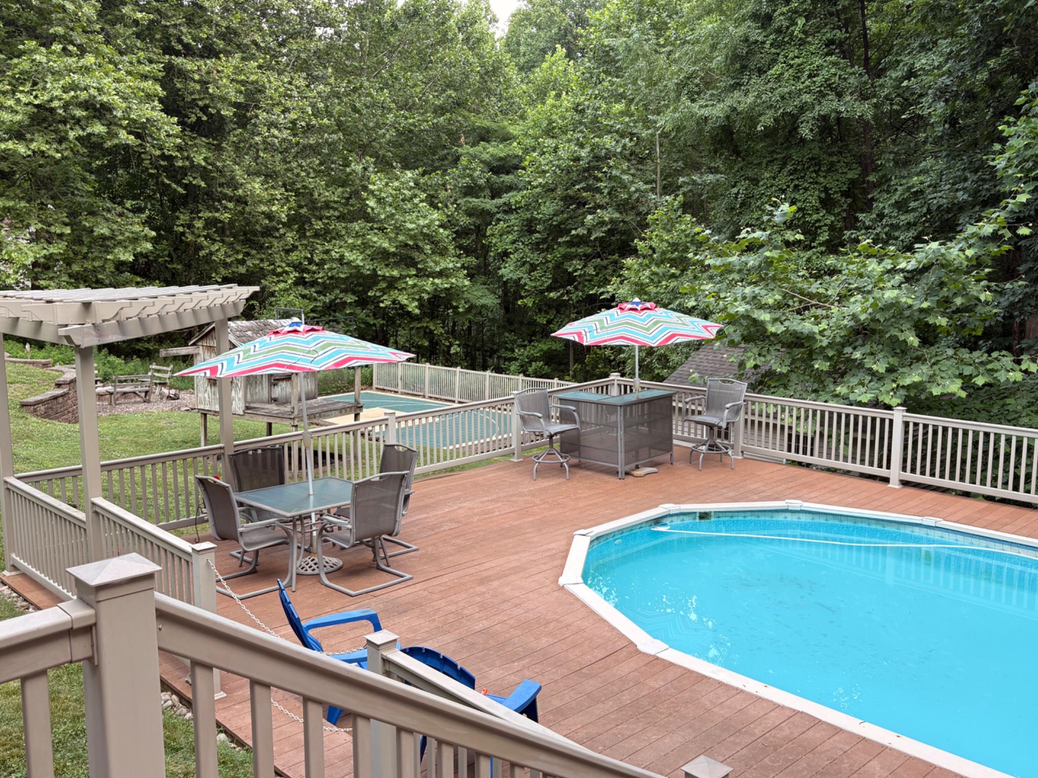 52 Hess Road Boyertown, PA 19512 - Photo 77 of 101 Serene backyard oasis with poolside charm.