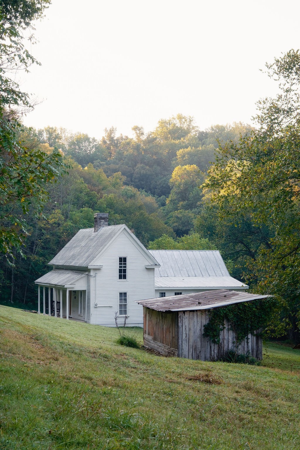 3685 Martin Ervin Road Santa Fe, TN 38482 - Photo 27 of 99 a aerial view of a house next to a yard and large trees