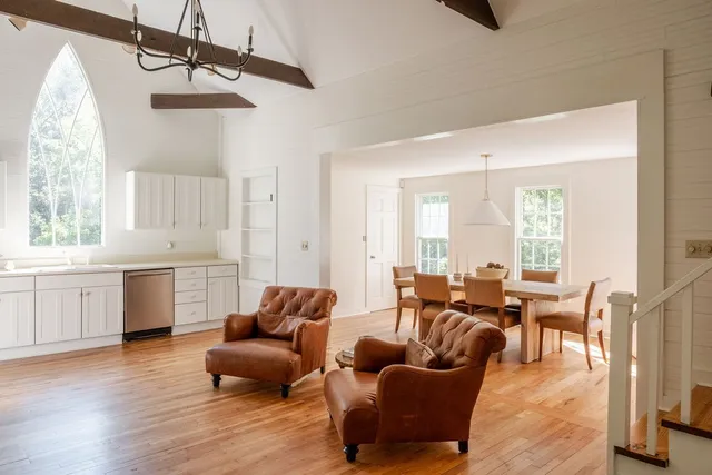 a backyard of a house with lots of trees