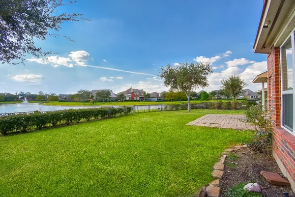 a view of a golf course with a lake