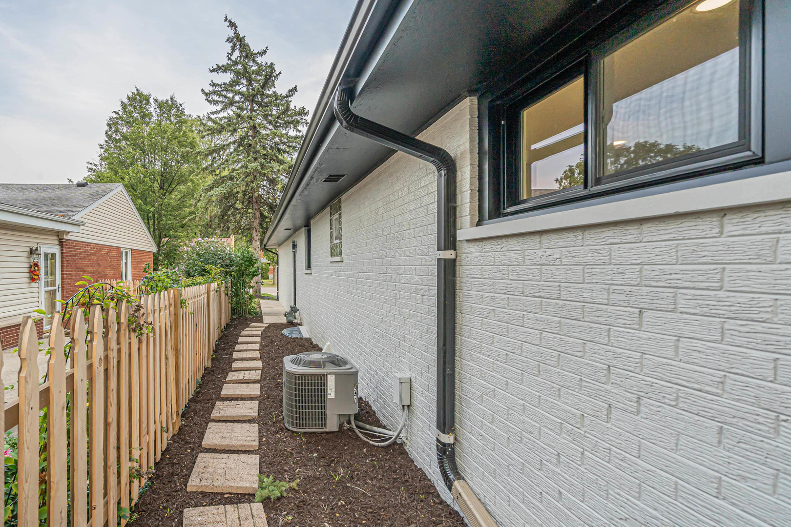 1844 Everett Avenue Des Plaines, IL 60018 - Photo 31 of 31 a view of a house with wooden stairs