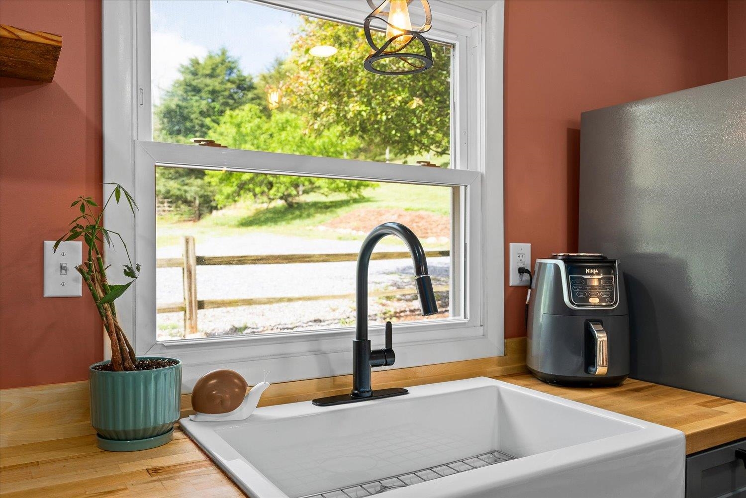 788 Hundley Distillery Road Churchville, VA 24421 - Photo 17 of 56 a kitchen with a sink and a window