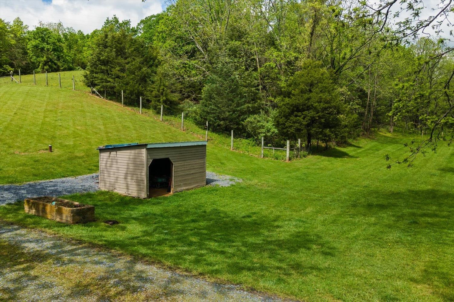 788 Hundley Distillery Road Churchville, VA 24421 - Photo 45 of 56 a view of a garden with a fountain