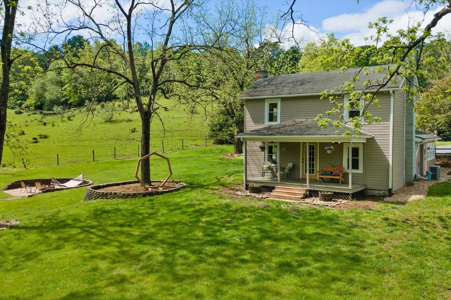 788 Hundley Distillery Road Churchville, VA 24421 - Photo 5 of 56 a front view of a house with garden and trees