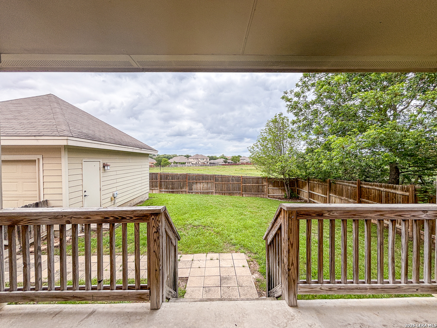 1908 Tanger Terrace New Braunfels, TX 78130 - Photo 21 of 22 a front view of a house with a yard