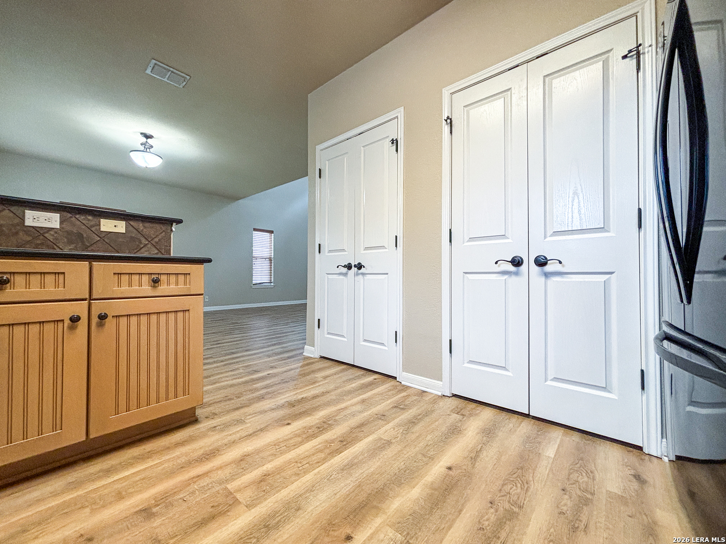 1908 Tanger Terrace New Braunfels, TX 78130 - Photo 9 of 22 a view of a hallway with wooden floor