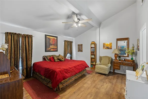 a bed room with a bed and a couch