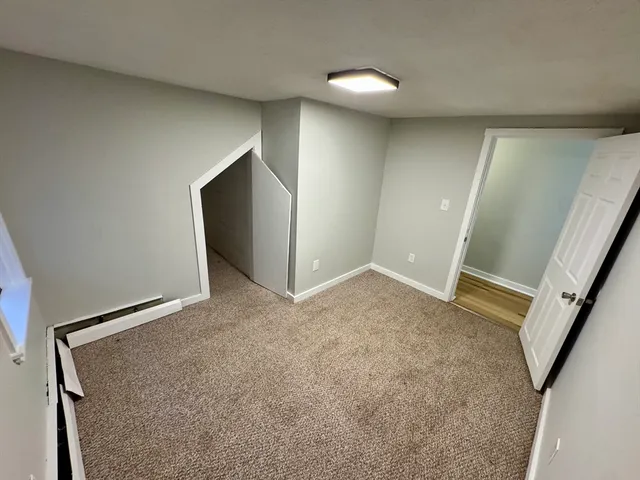 an empty room with a workbench