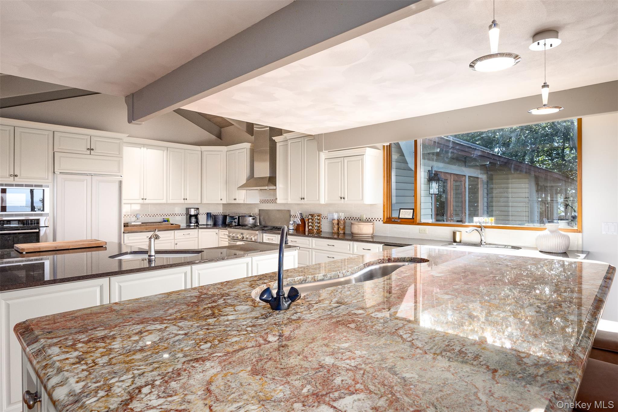 12 Mountain Brook Road Cornwall, NY 12518 - Photo 19 of 50 Kitchen with white cabinets, dark stone counters, wall chimney exhaust hood, and stainless steel oven