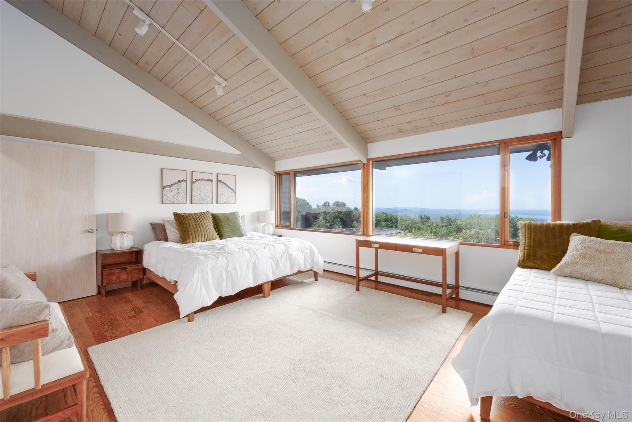 12 Mountain Brook Road Cornwall, NY 12518 - Photo 33 of 50 Bedroom featuring wood finished floors, a baseboard radiator, wooden ceiling, and rail lighting