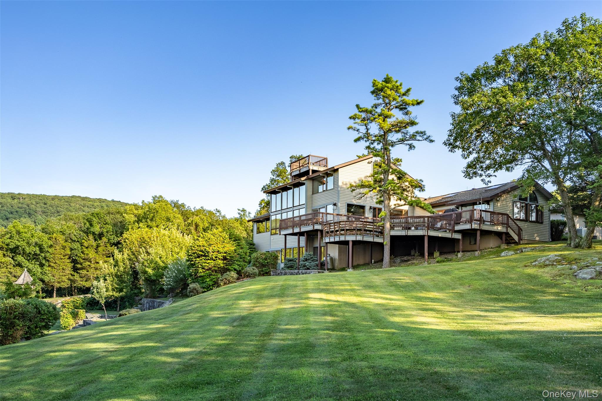 12 Mountain Brook Road Cornwall, NY 12518 - Photo 50 of 50 View of green lawn featuring a deck