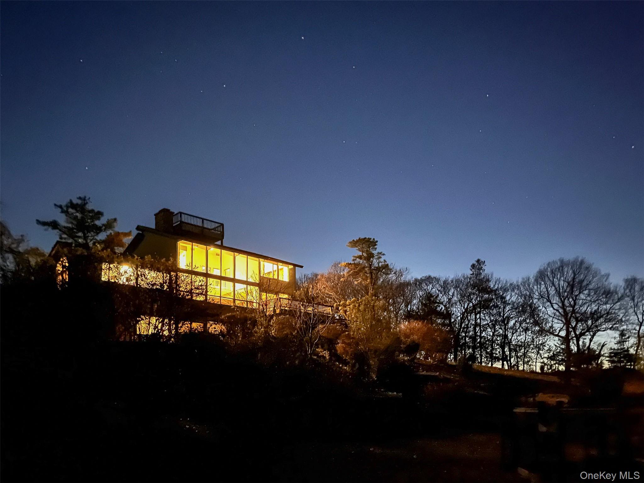 12 Mountain Brook Road Cornwall, NY 12518 - Photo 7 of 50 View of back of house at night