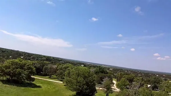 a view of a lake with a mountain in the background