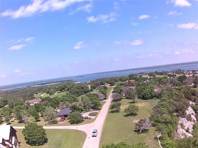 a view of a city and mountains in the background