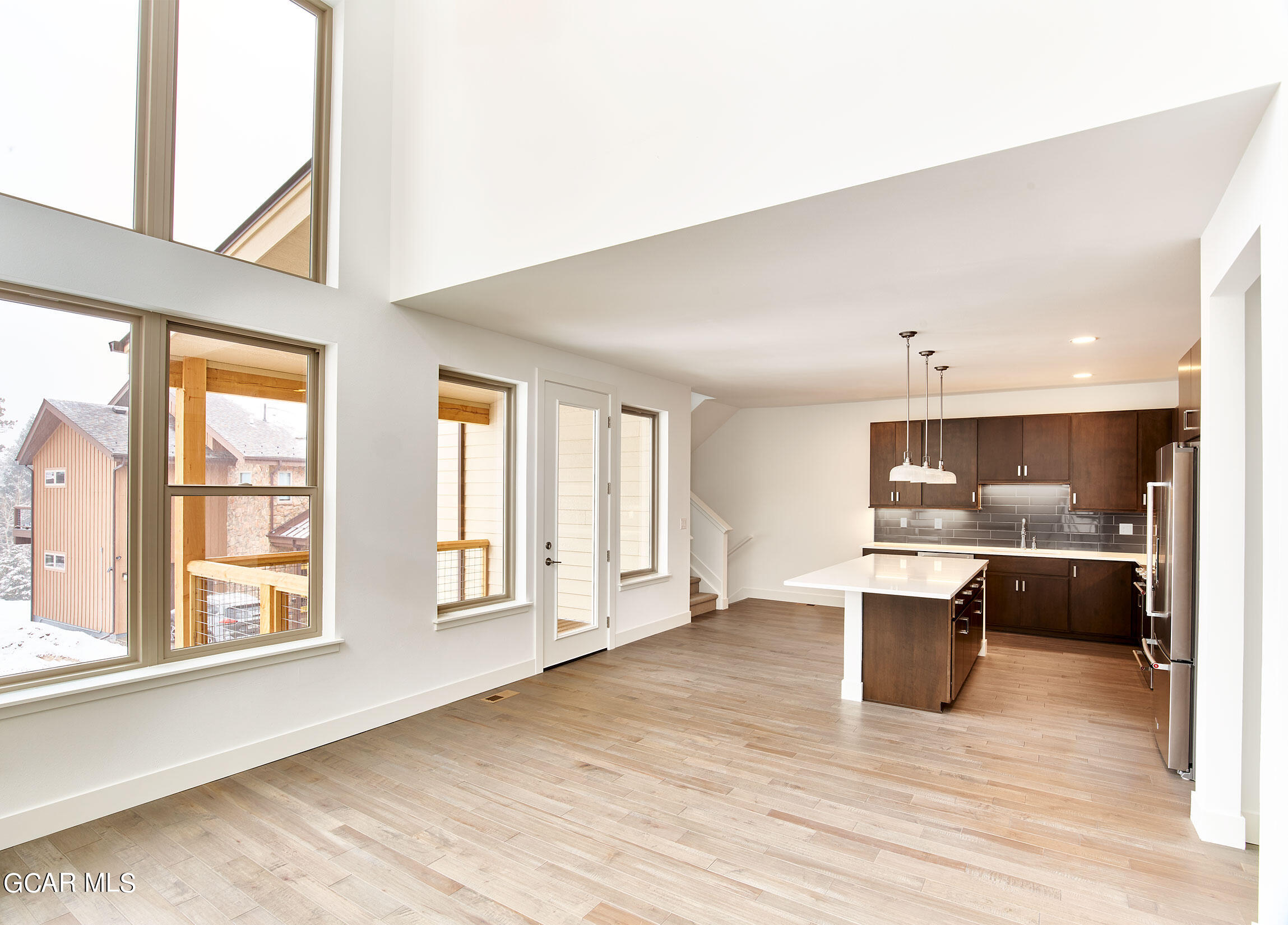 110 River Run Circle Fraser, CO 80442 - Photo 8 of 13 a view of a dining room with furniture window and wooden floor