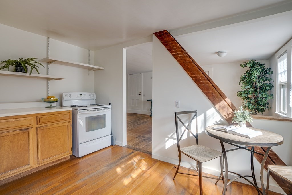 9 Addison Street Arlington, MA 02476 - Photo 31 of 41 a kitchen with stainless steel appliances stove top oven and cabinets