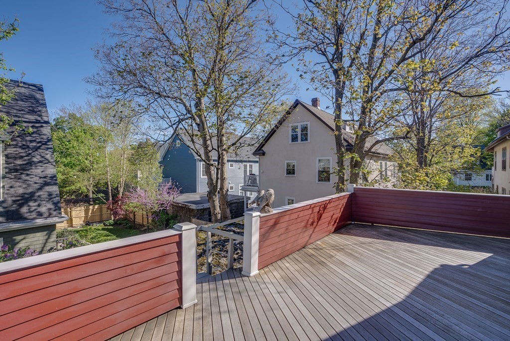 9 Addison Street Arlington, MA 02476 - Photo 34 of 41 a view of house with wooden deck and trees