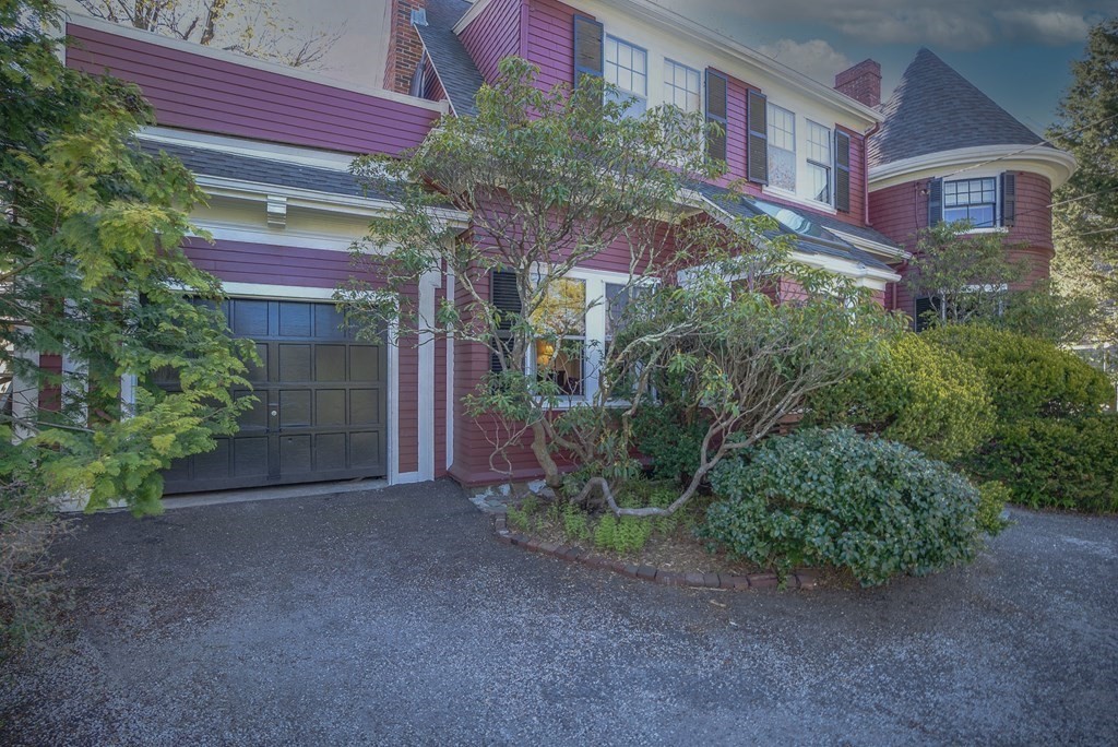 9 Addison Street Arlington, MA 02476 - Photo 37 of 41 a view of a brick building with a yard