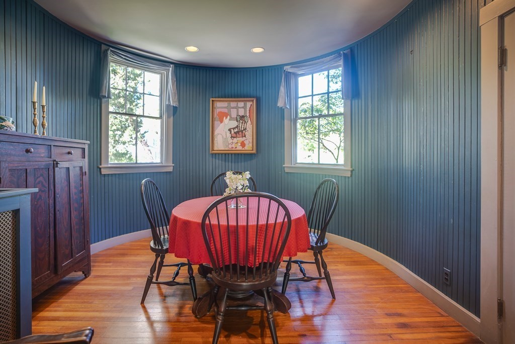 9 Addison Street Arlington, MA 02476 - Photo 10 of 41 a view of a dining room with furniture window and wooden floor