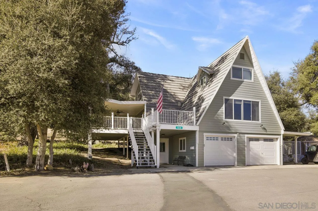 a view of a house with a street