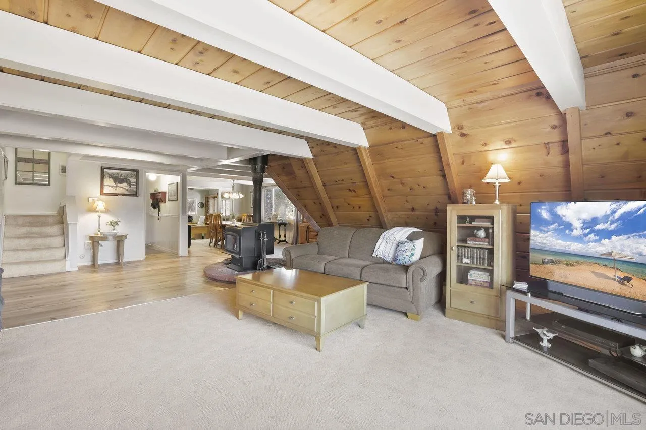 9018 Vernal Lane Descanso, CA 91916 - Photo 11 of 56 a living room with furniture and wooden floor