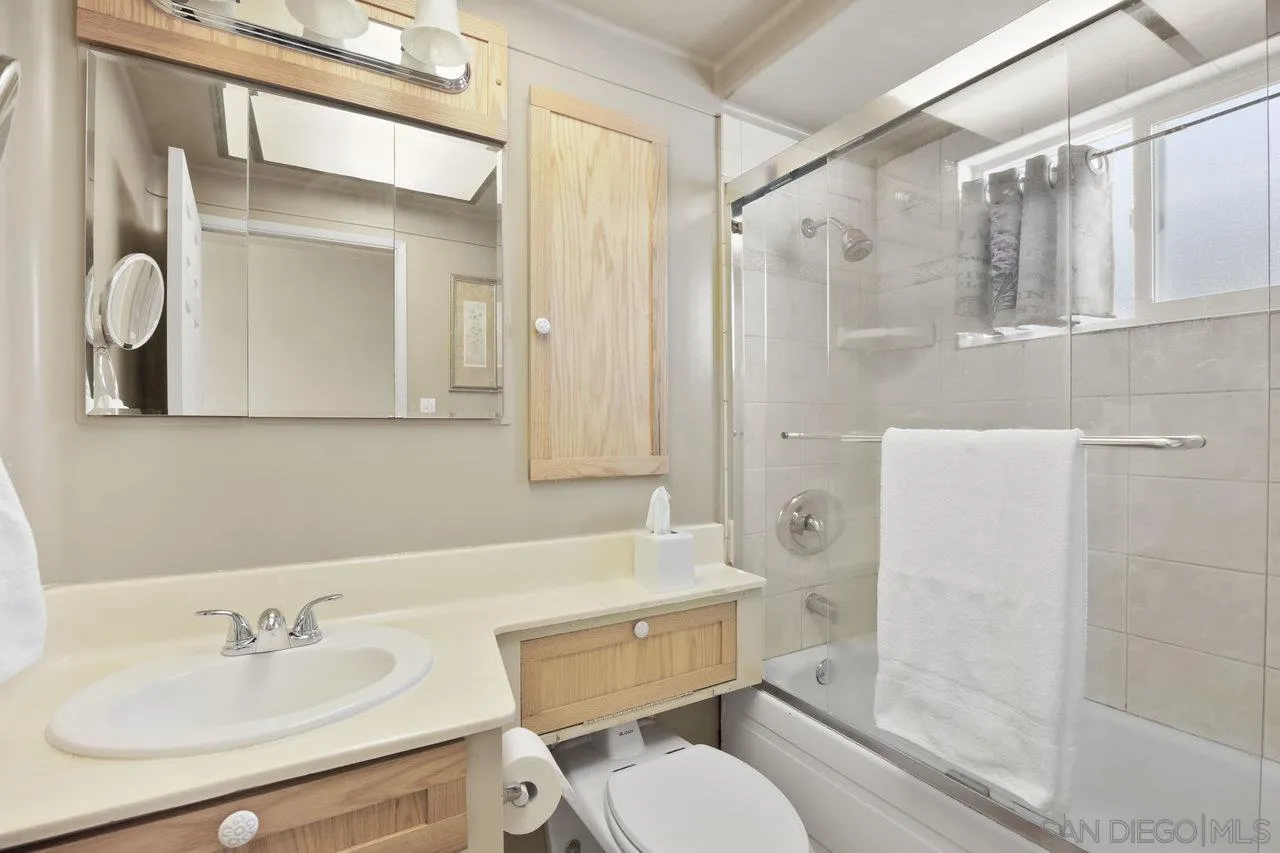 9018 Vernal Lane Descanso, CA 91916 - Photo 22 of 56 a bathroom with a sink toilet and shower