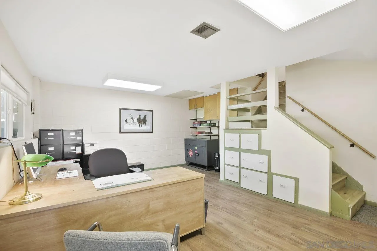 9018 Vernal Lane Descanso, CA 91916 - Photo 23 of 56 a bedroom with a bed and a view of kitchen