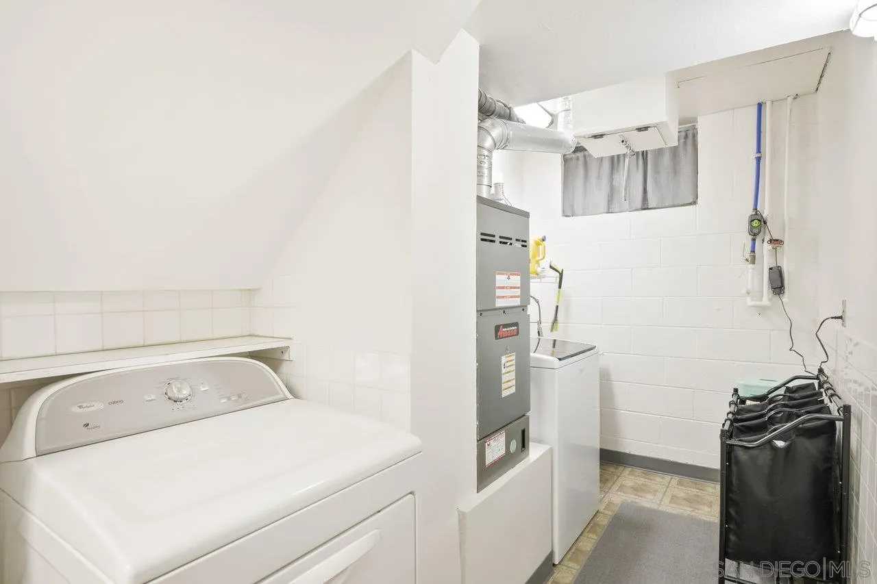 9018 Vernal Lane Descanso, CA 91916 - Photo 25 of 56 a utility room with dryer and washer