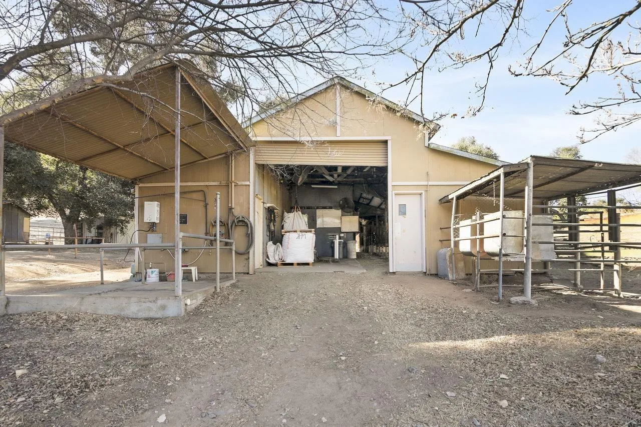 9018 Vernal Lane Descanso, CA 91916 - Photo 43 of 56 a view of a house with a yard and wooden fence